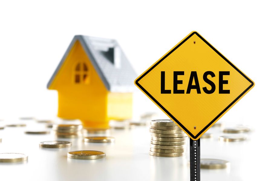 lease-sign-with-coins-around-it