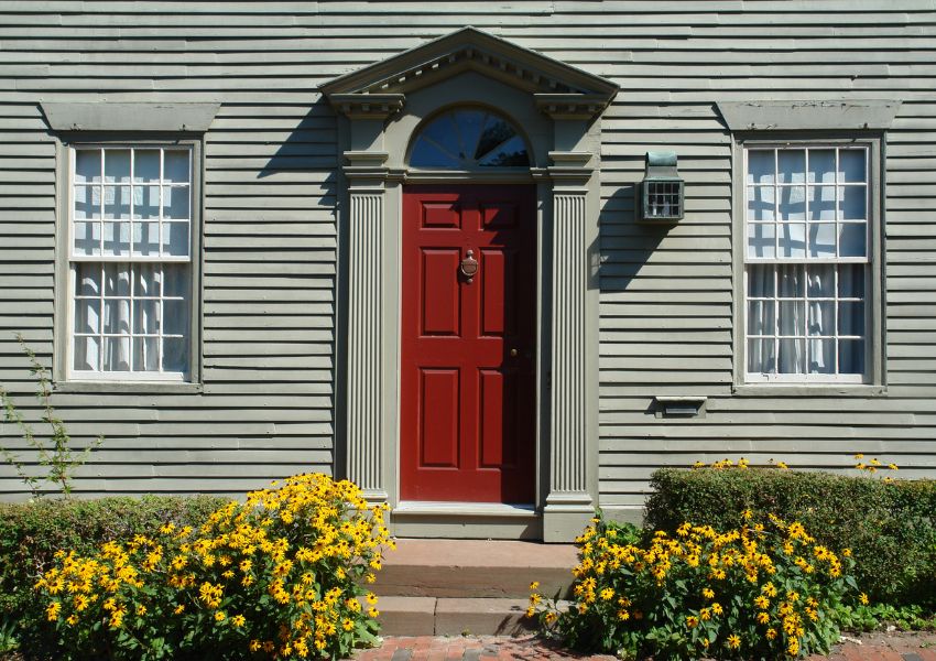 door-with-pillars-and-bushes